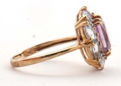 Lot 80 - A 9ct amethyst, topaz and diamond ring, the...