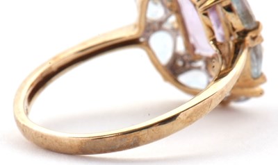 Lot 80 - A 9ct amethyst, topaz and diamond ring, the...