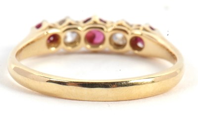 Lot 50 - A ruby and diamond ring, the alternating round...