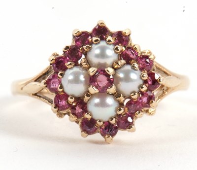 Lot 47 - A 9ct ruby and split pearl ring, the central...