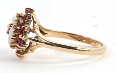 Lot 47 - A 9ct ruby and split pearl ring, the central...