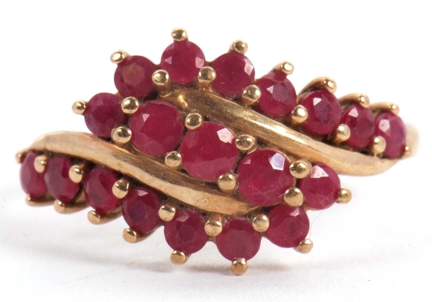 Lot 49 - A 9ct ruby ring, with three crossover style...