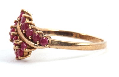 Lot 49 - A 9ct ruby ring, with three crossover style...