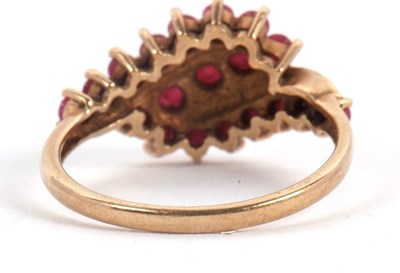 Lot 49 - A 9ct ruby ring, with three crossover style...