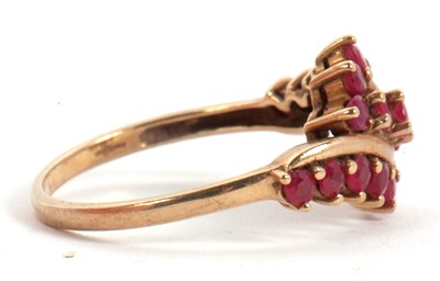 Lot 49 - A 9ct ruby ring, with three crossover style...