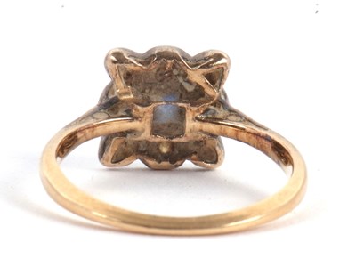 Lot 46 - A sapphire and diamond ring, the central...