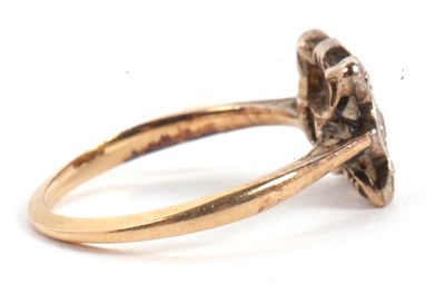 Lot 46 - A sapphire and diamond ring, the central...