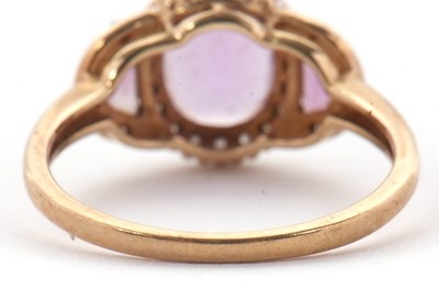 Lot 45 - A 9ct amethyst and diamond ring, the three...