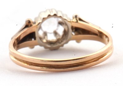 Lot 87 - A white stone ring, the round white stone,...