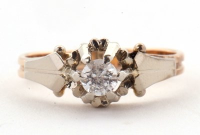 Lot 87 - A white stone ring, the round white stone,...