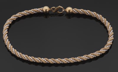 Lot 261 - A gold and cultured pearl necklace, the...
