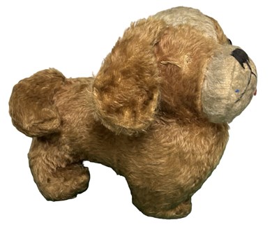 Lot 461 - An early 20th century straw stuffed dog, in...