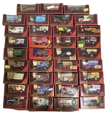 Lot 280 - A collection of red-boxed Matchbox Models of...