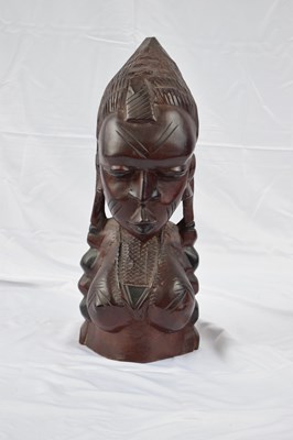 Lot 208 - 20th century West African hardwood bust of a...
