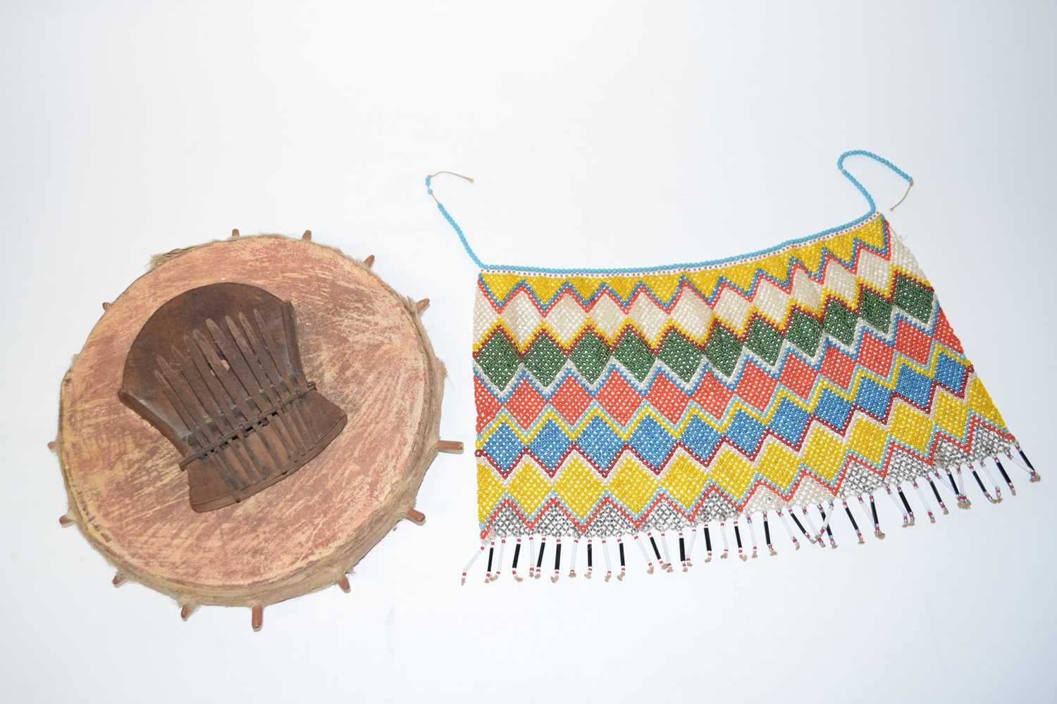 Lot 362 - ZIMBABWEAN Mbira (Musical Instrument) and Beaded Apron