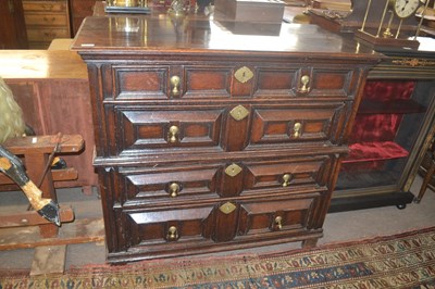 Lot 404 - A Jacobean oak chest of two short over three...