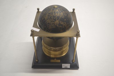 Lot 409 - A novelty globe clock by the National...
