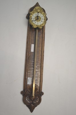 Lot 411 - A 20th Century ratchet clock with pressed...