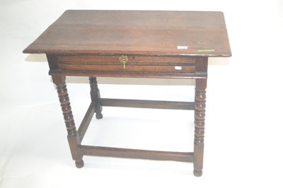 Lot 425 - An 18th Century oak single drawer side table...