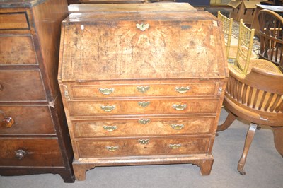 Lot 439 - An early Georgian walnut bureau of typical...