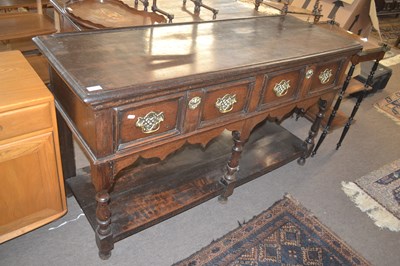 Lot 451 - An 18th Century style oak dresser base with...