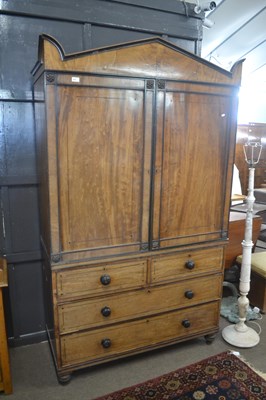 Lot 459 - A Georgian mahogany and ebonised linen press...