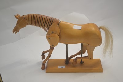 Lot 464 - A modern articulated model of a horse raised...