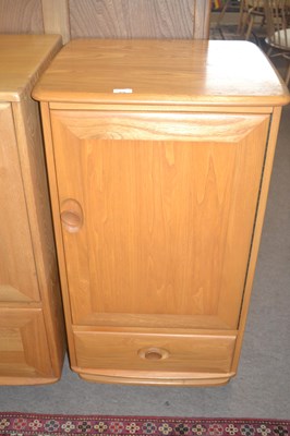 Lot 474 - An Ercol light elm hi-fi cabinet with hinged...
