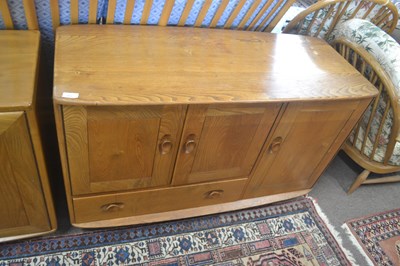 Lot 482 - An Ercol light elm sideboard of small...