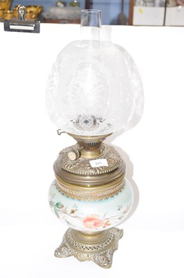 Lot 225 - A late 19th Century oil lamp with shade, the...