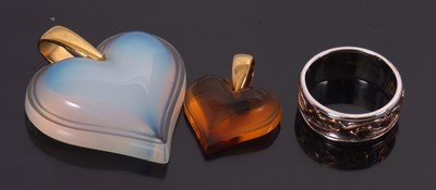 Lot 51 - A Clogau ring and two Lalique pendants: the...