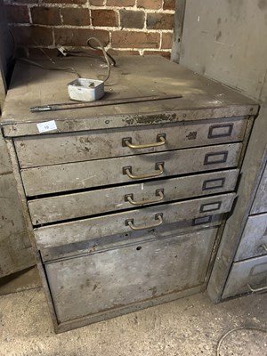 Lot 10 - A heavy duty metal tool cabinet with sliding...
