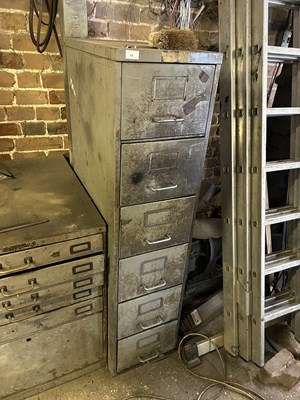 Lot 11 - A metal filing cabinet with pull out drawers...
