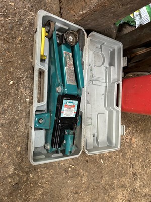 Lot 63 - A Kamasa two tonne trolley jack together with...