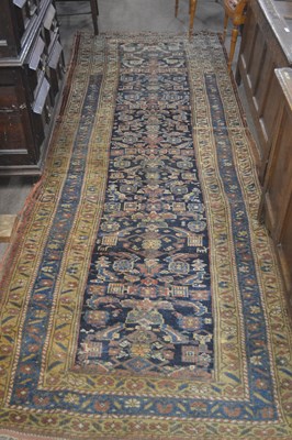 Lot 619 - A 19th Century Causasian runner carpet with a...