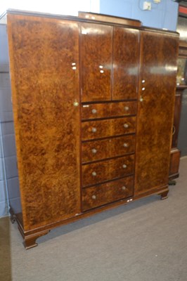 Lot 393 - An early 20th Century Art Deco style walnut...