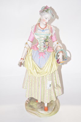 Lot 278 - A large French porcelain figure of a flower...