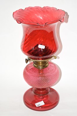 Lot 261 - A 19th Century cranberry glass oil lamp with...