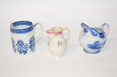 Lot 330 - A pearl ware mug with floral design together...
