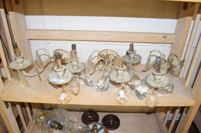 Lot 527 - THREE METAL TWO-LIGHT WALL BRACKETS WITH GLASS...