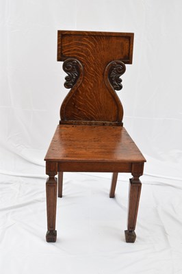 Lot 228 - 19th century oak hall chair with shaped and...