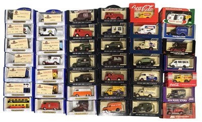Lot 305 - A collection of various boxed die-cast cars,...