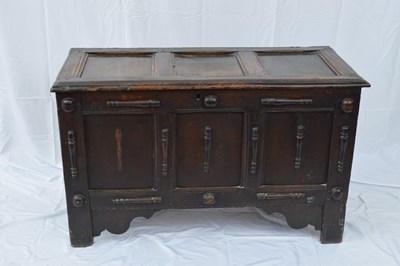 Lot 233 - 17th century oak coffer with three panelled...