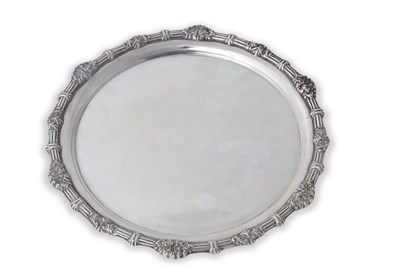 Lot 179 - A George V silver salver of circular form, the...