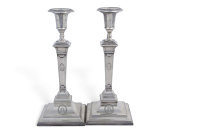Lot 188 - A pair of George III silver candlesticks...