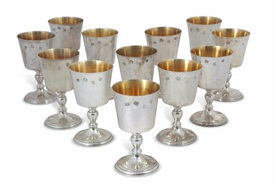 Lot 189 - A set of twelve Elizabeth II silver goblets...