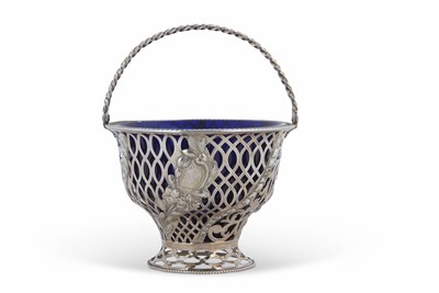 Lot 201A - A George III silver sugar basket pierced...