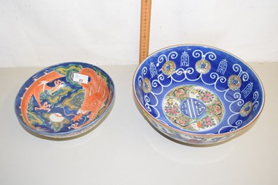 Lot 23 - A Chinese circular pedestal bowl decorated in...