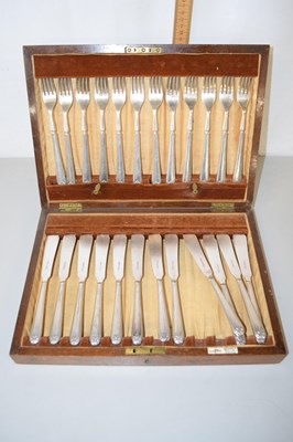 Lot 151 - Walker & Hall silver plated fish cutlery in...