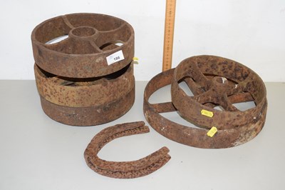 Lot 186 - A group of various iron implement wheels and...